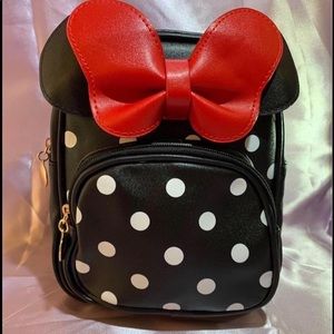 Minnie mouse backpack purse I have three different colors red black and blue